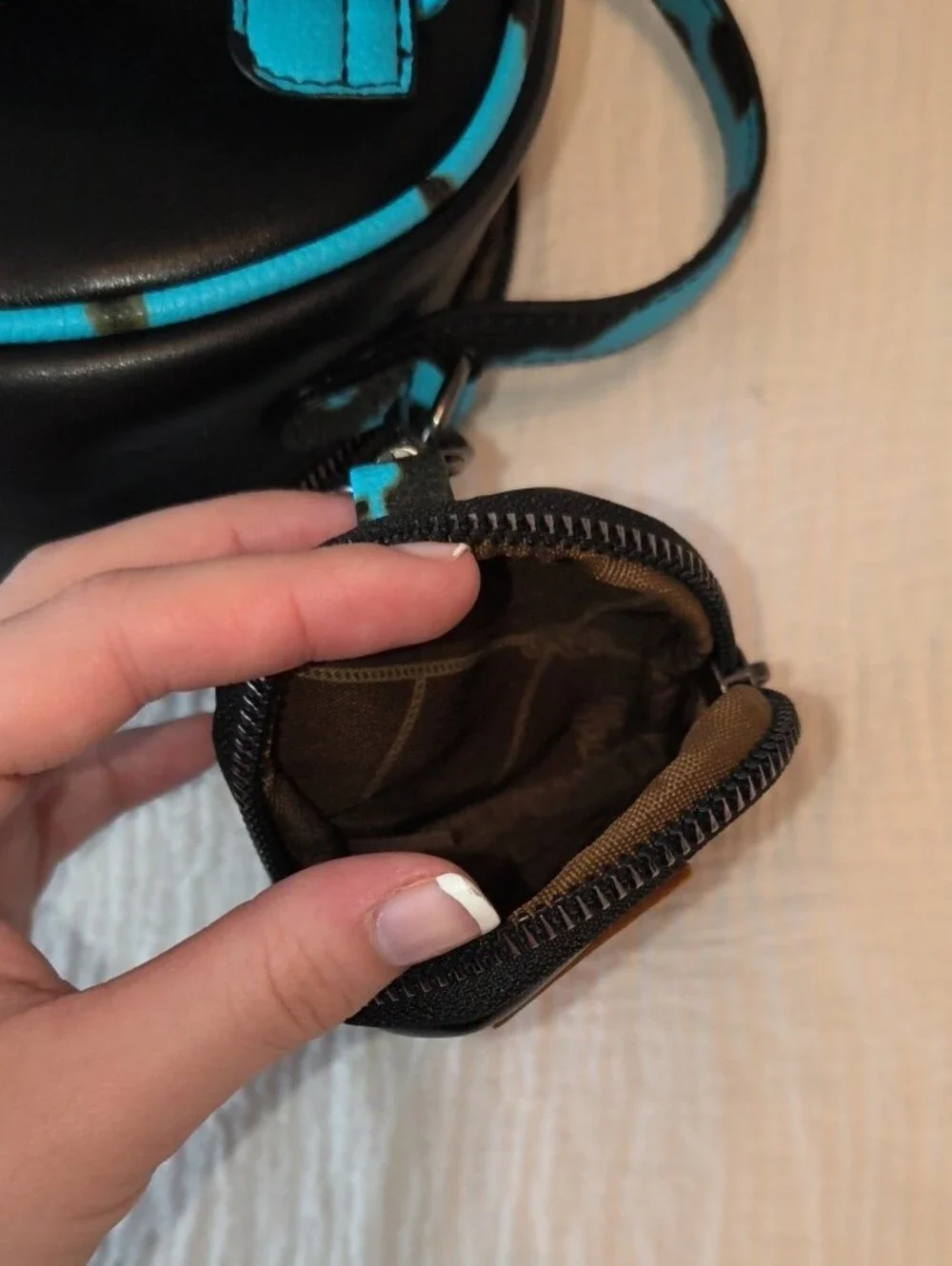 Wrangler Black and Turquoise Mini Backpack with Accent Straps